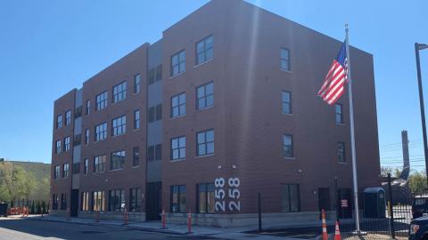 A finished renovation of a brick apartment building