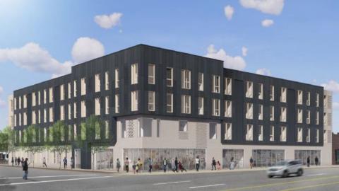 A rendering of a 4-story grey apartment building with a white facade on the first floor