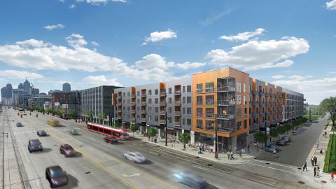 A rendering of a large 5 story apartment building along two street corners