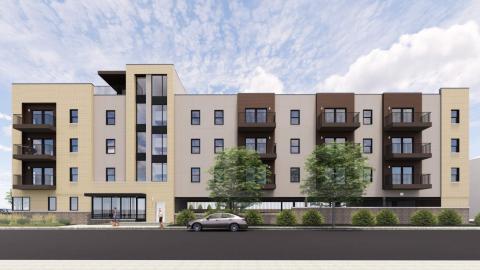 A rendering of a four story apartment building