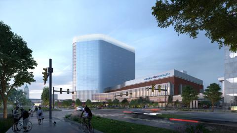 A rendering of a hospital tower with a shorter building next to it